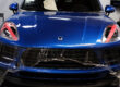 blue Porsche Macan with clear bra being installed